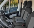 Peugeot Boxer III Furgon - Komplet Miarowych Pokrowców DV1+DV2 (fotel kierowcy + dwuosobowa kanapa pasażera) - funkcjonalność - otwierany stolik